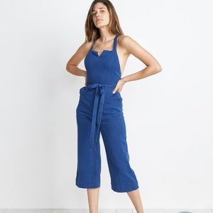 Linen jumpsuit in indigo with cross crossing back